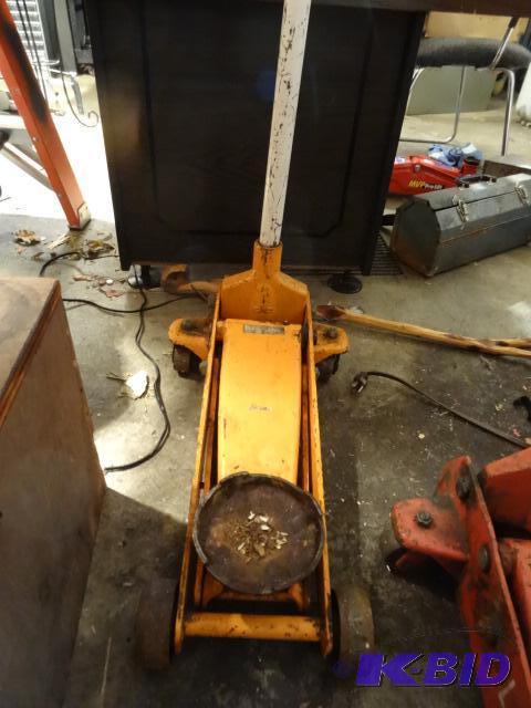 lot 104 image: Rolling Floor Jack Works...