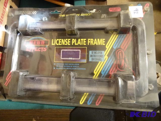 lot 92 image: Neon Effects License Plate Frame. New...