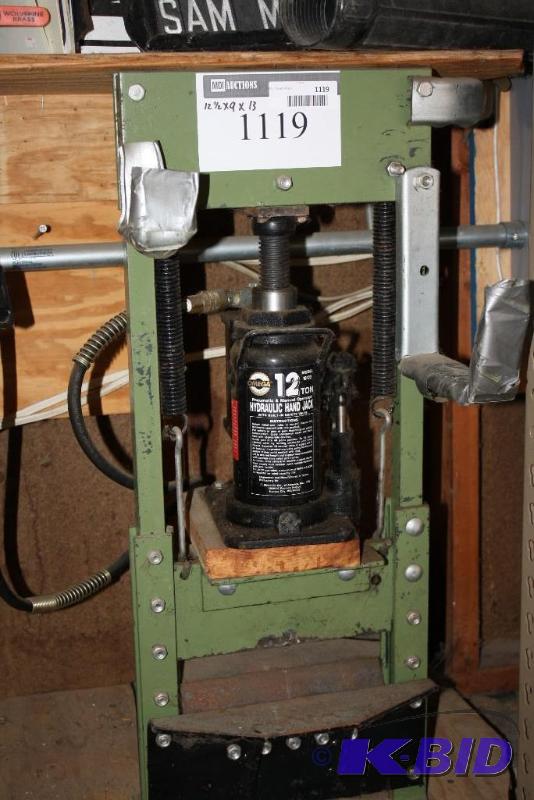 lot 1119 image: Pnuematic over Hydraulic 12 ton small Frame Press on Low Bench Frame