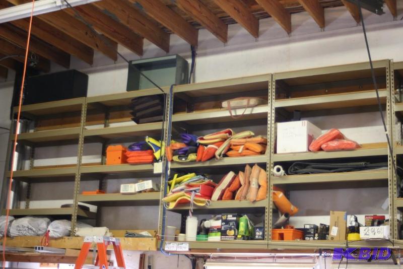 lot 417 image: Contents of Shelving Units Including Life PreservesJackets Orange Tool Box Tool Box Insert And