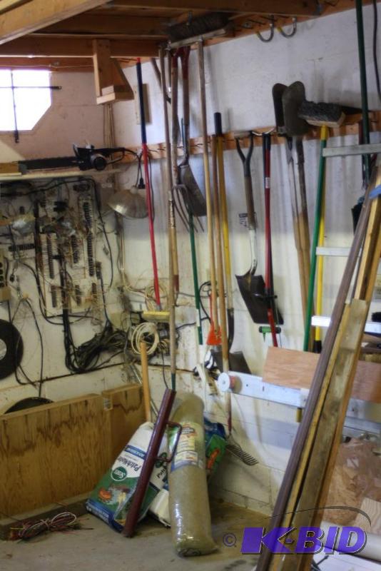 lot 427 image: Corner Lot of Yard Tools Including Chain Saw Metal Shovels Broom And More.