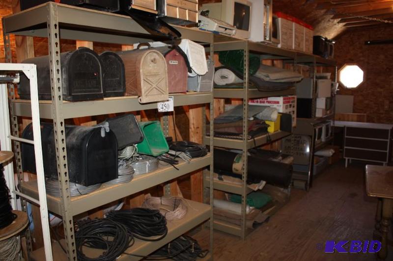 lot 450 image: Lot of (3) Shelving Units Including Contents Mailboxes Cords Car Mats Does Not Include Monitors.