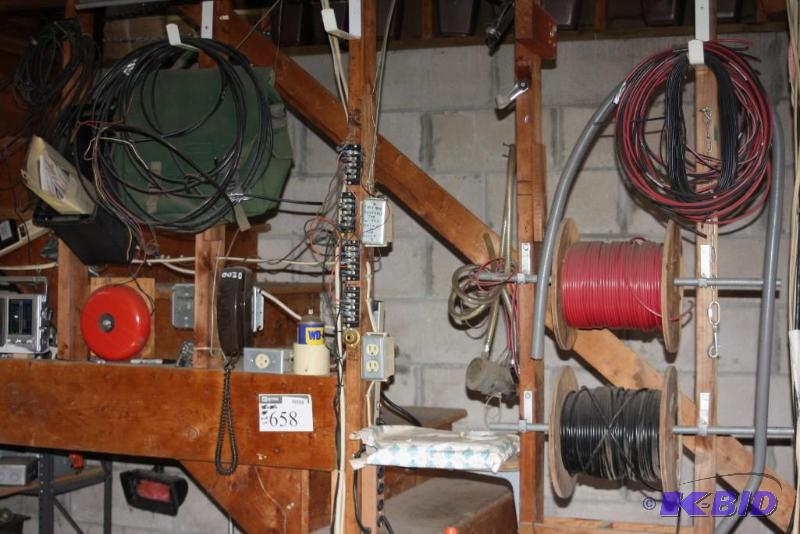 lot 658 image: Wall Lot Including Bundled WireCable Orange Caution Cones Hammer And More.