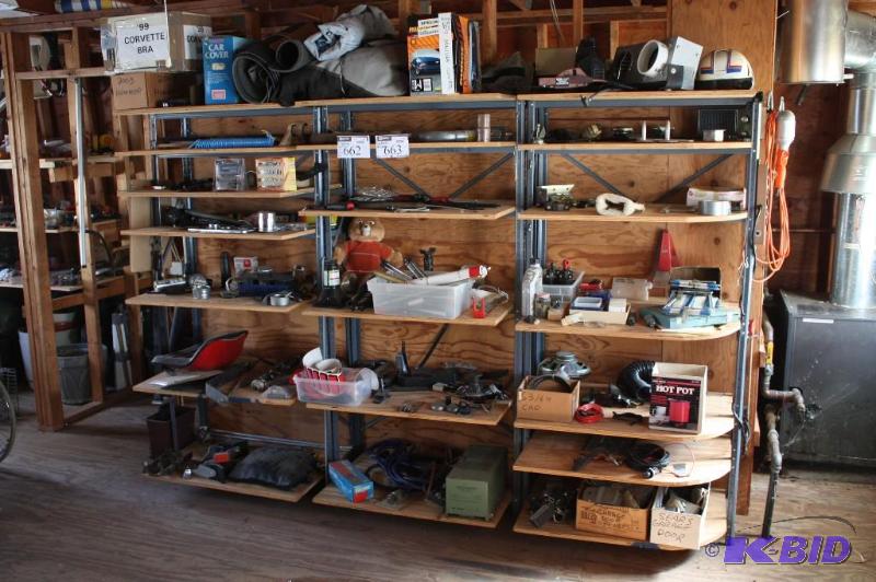 lot 663 image: Contents of Shelves Including 99 Corvette Bra 2003 Hummer Bra 2007 Minivan Cover And More.