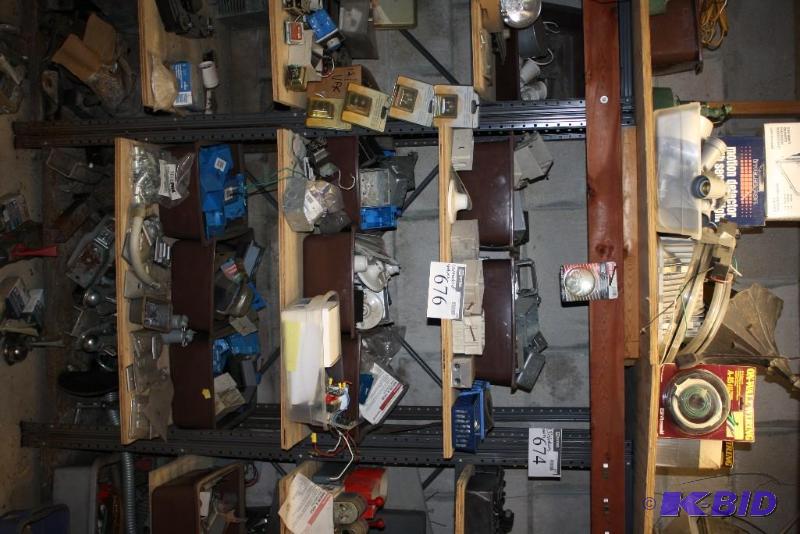 lot 676 image: Shelf and Contents Include Poly Electric Boxes, Ball Hitch Replacements and More