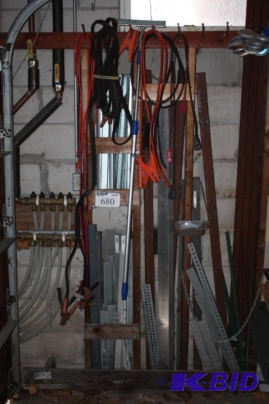 lot 680 image: Wall Lot Including Jumper Cables Miscellaneous Cords Fuse Boxes Scrap Metal And More.