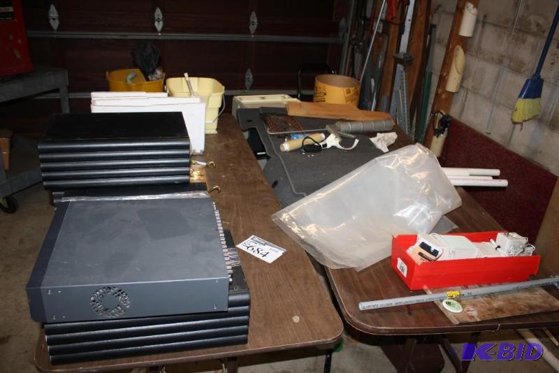 lot 684 image: Contents of Tables Including Coat Hangers wWooden Mount Metal Hardware Plastic Bins And More.