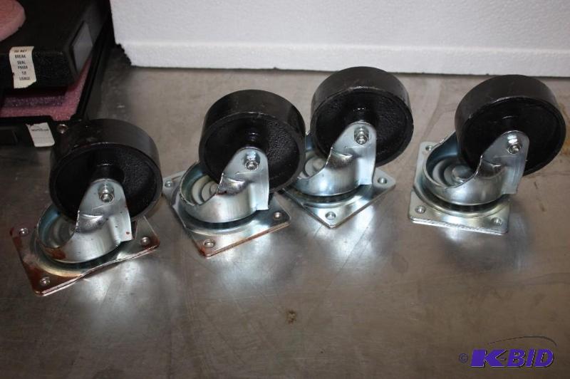 lot 105 image: Lot of (4) Heavy-Duty Wheels wMetal Frames & Screw Down Housing.