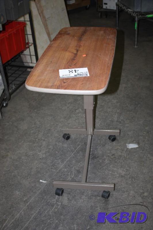 lot 48 image: Rolling Table wWheels & Metal Frame Wooden Top 20 x 34 x 39.