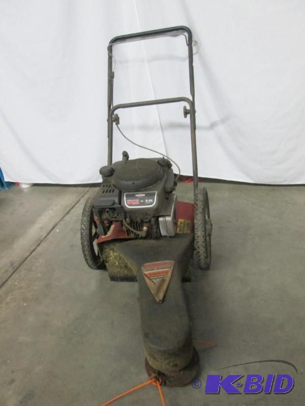 lot 7 image: Swisher High Weed Lawn Mower