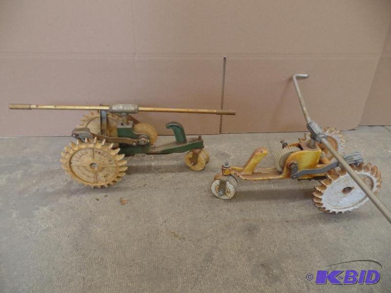 2 Vintage Tractor Sprinklers
