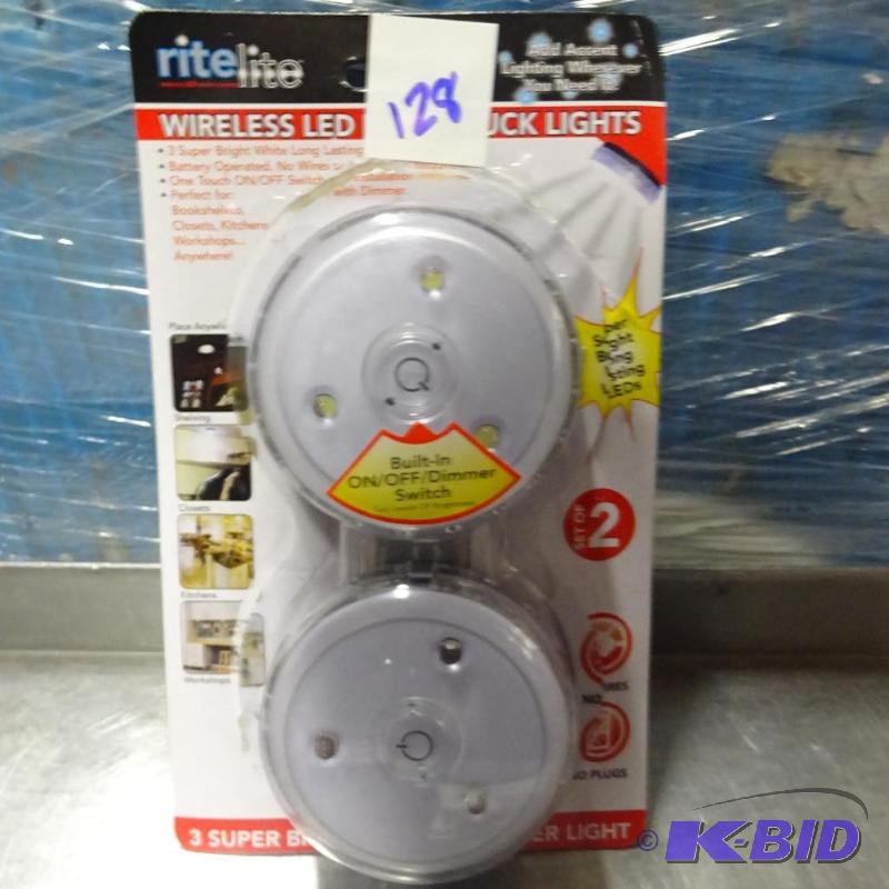 lot 128 image: New Rite Light wireless LED puck lights. 2 pa...