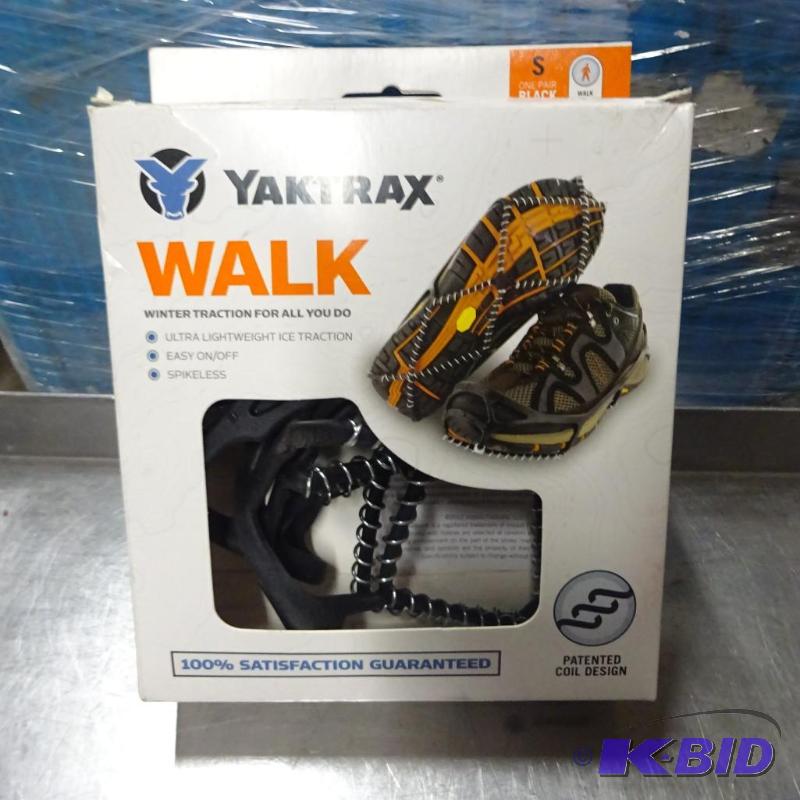lot 135 image: New pair of YakTrax strap on traction crasmpo...