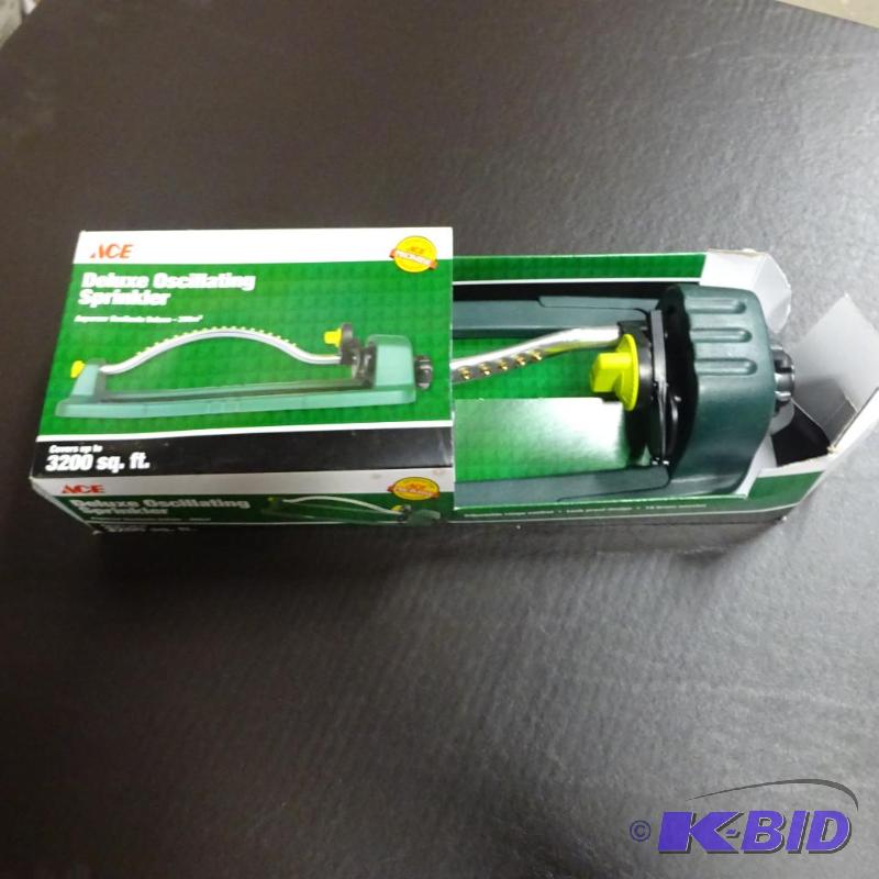 lot 15 image: New ACE brand deluxe oscillating sprinkler. P...