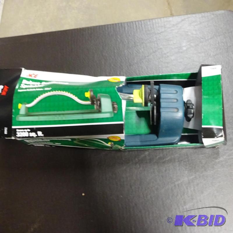 lot 35 image: Used Ace brand deluxe oscillating sprinkler...