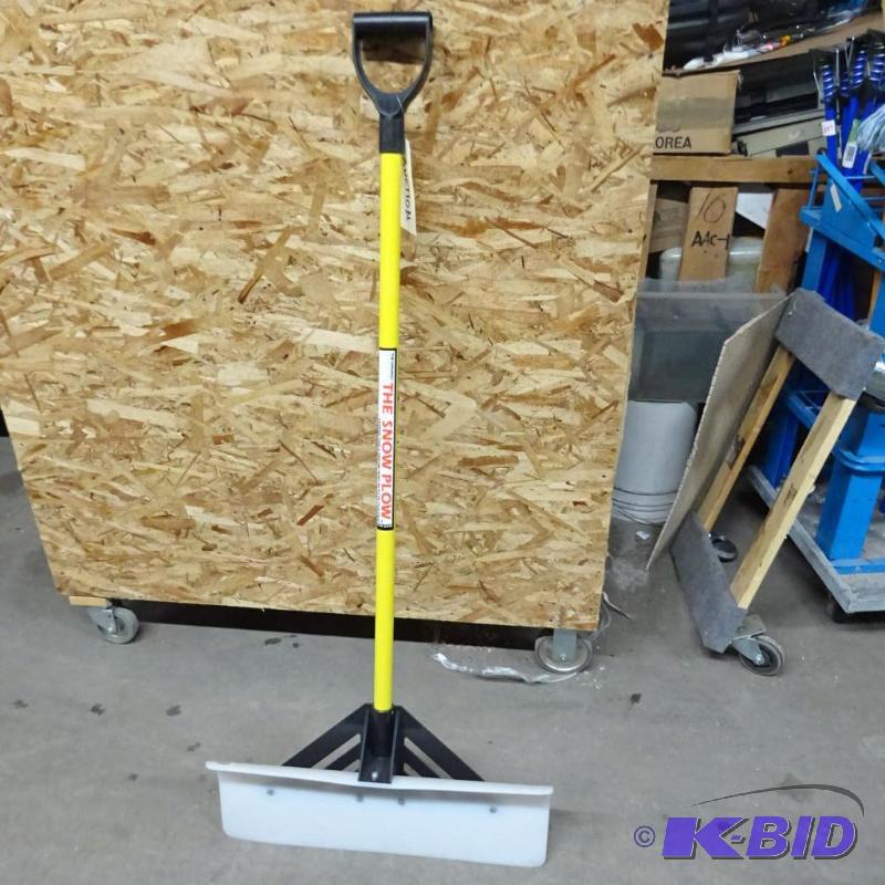 lot 44 image: New the original Snow Plow 24 in poly snow pu...