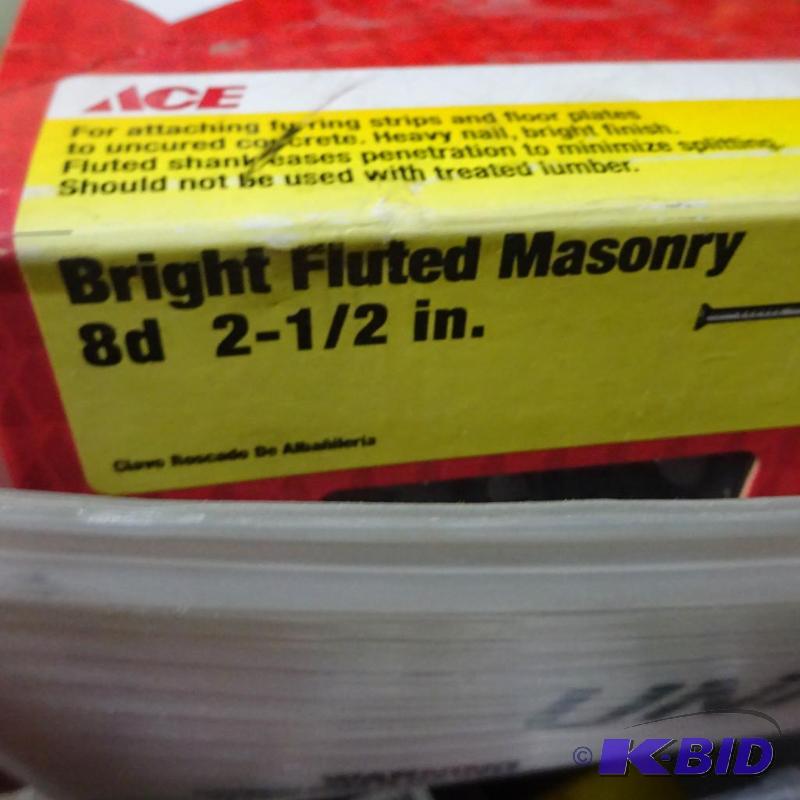 lot 65 image: New 5 lb box bright fluted masonary nails. 8d...