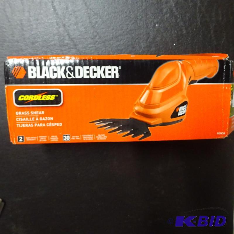 lot 71 image: Black and Decker cordless grass shear. Appear...