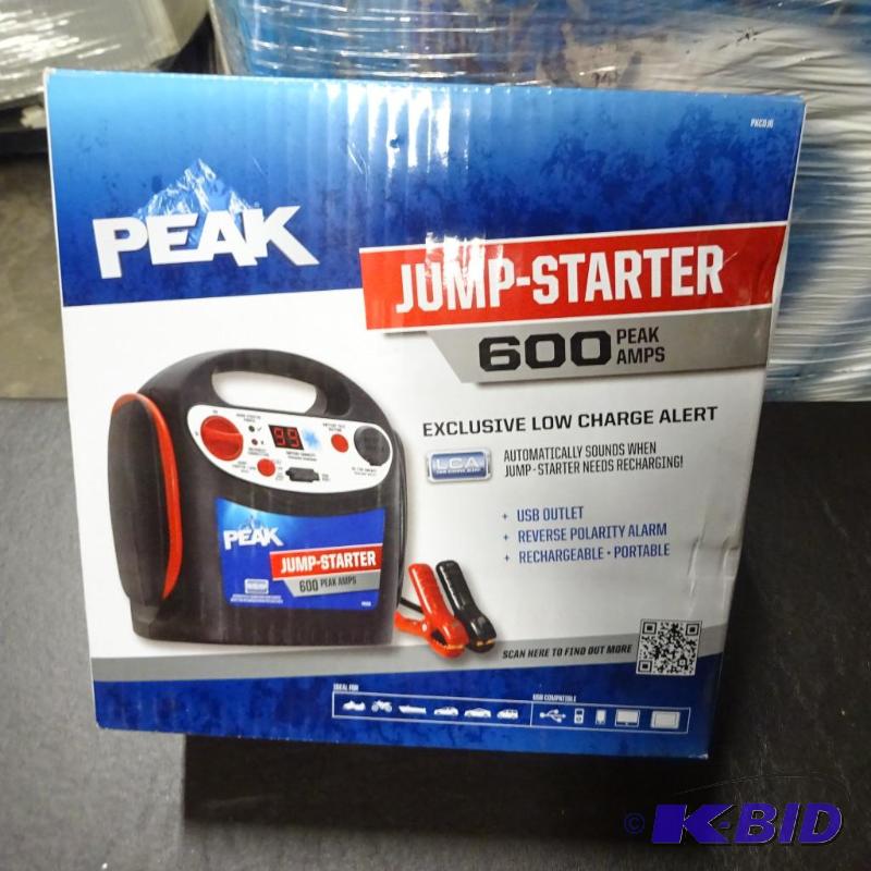 lot 72 image: New PEAK 600 amp jump starter and battery. In...