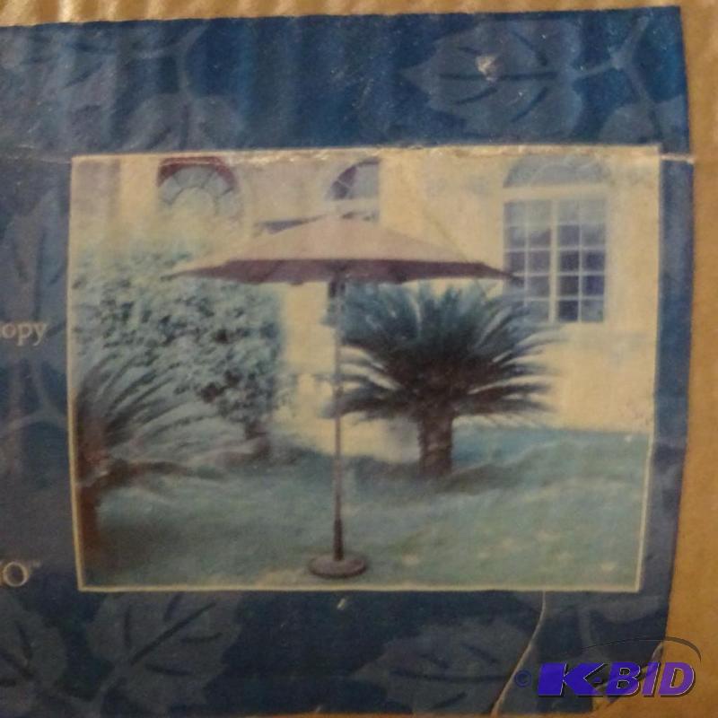 lot 8 image: New southern patio brand 8 foot market umbrel...