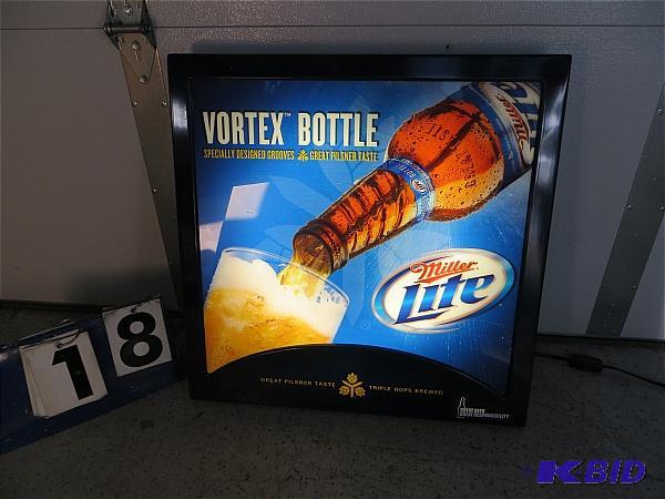 lot 18 image: Miller Lite Vortex Bottle Lighted Sign. Works.