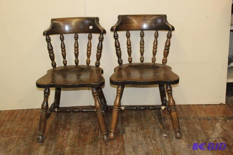lot 109 image: Pair of solid wood chairs that my puppy chewe...