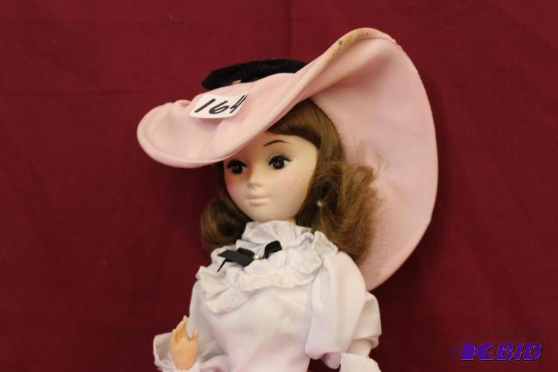 lot 164 image: Porcelain Doll by Bradley Dolls...