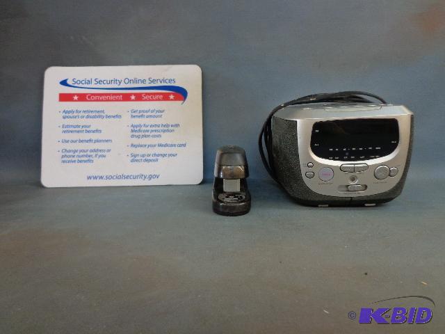 Mouse Pad, Magnavox Disc Clock Radio and Stap...