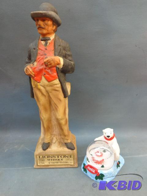 Coca Cola Snow Globe and Lionstone Decanter  ...