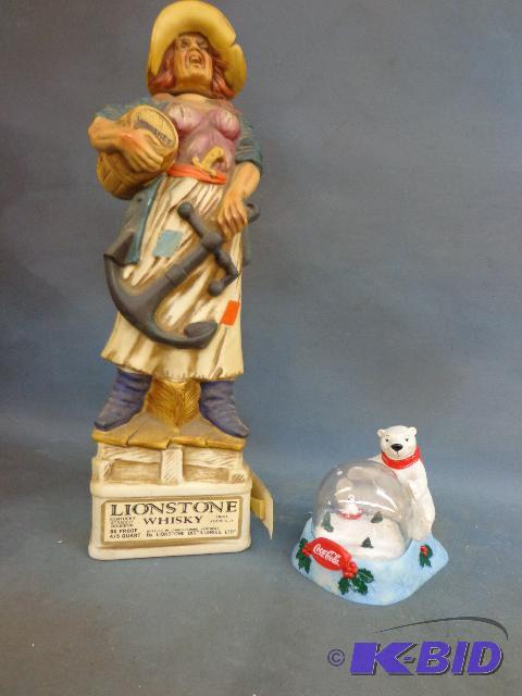 Coca Cola Bear Snow Globe and Lionstone Decan...