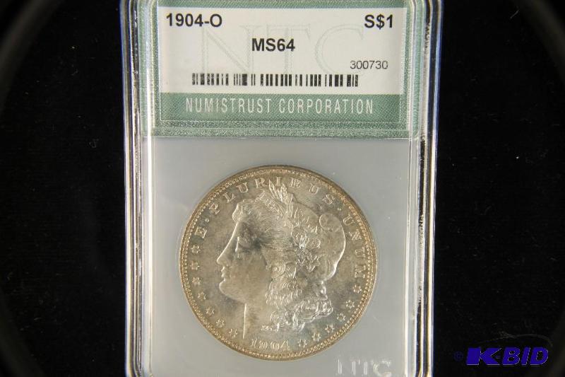 lot 131 image: 1904-O MORGAN DOLLAR BU MS 64 NTC
