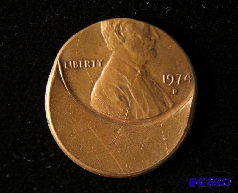 lot 145 image: 1974 D LINCOLN MEMORIAL CENT STRUCK 50% OFF CENTER