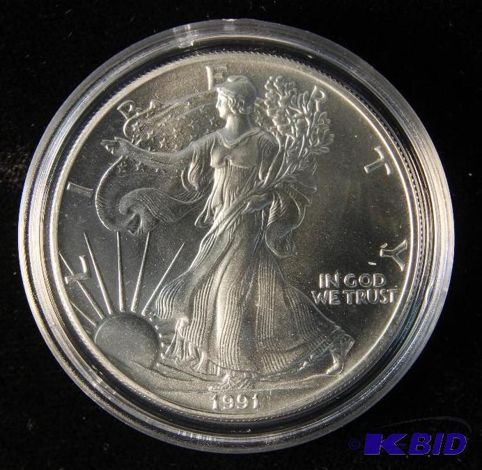 lot 55 image: 1991 AMERICAN EAGLE 1 TROY Oz. .999 FINE SILVER US DOLLAR COIN IN AIRTIGHT HOLDER