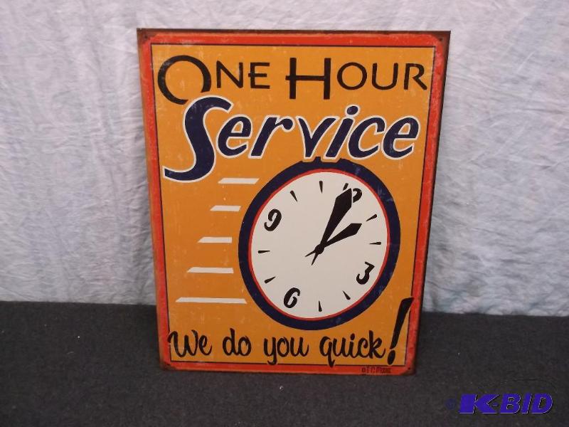 Collectable metal One Hour Service sign measu...