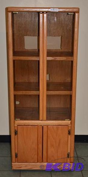 lot 18 image: Oak wooden glass door display cabinet 17x24x6...