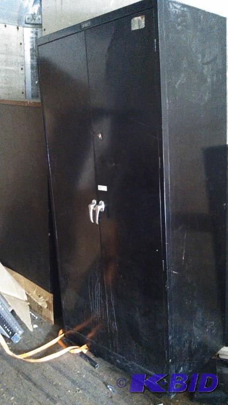 lot 100 image: Metal 2 door cabinet. 36 x 24 x 78. 5 shelf...