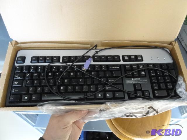 lot 15 image: HP computer keyboard...