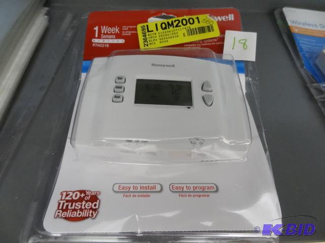 lot 18 image: Honeywell programmable T stat...