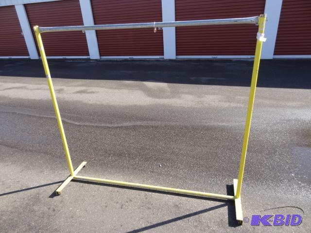 lot 48 image: Metal clothes rack. 68 x 61...
