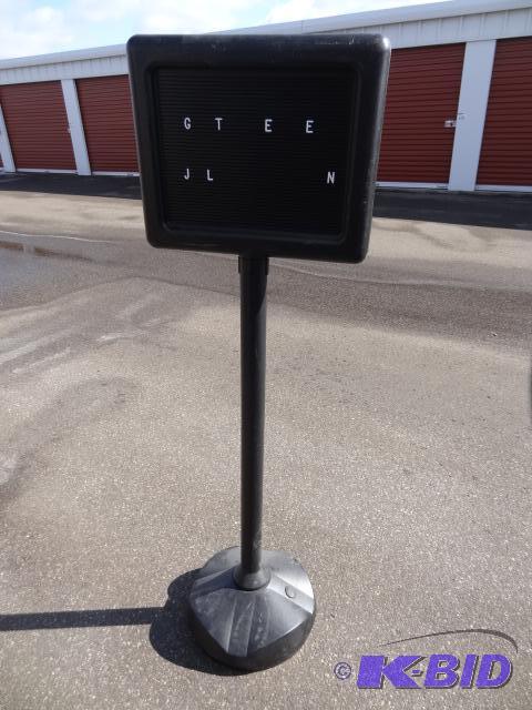 lot 53 image: Poly message sign. Add water or sand to base ...