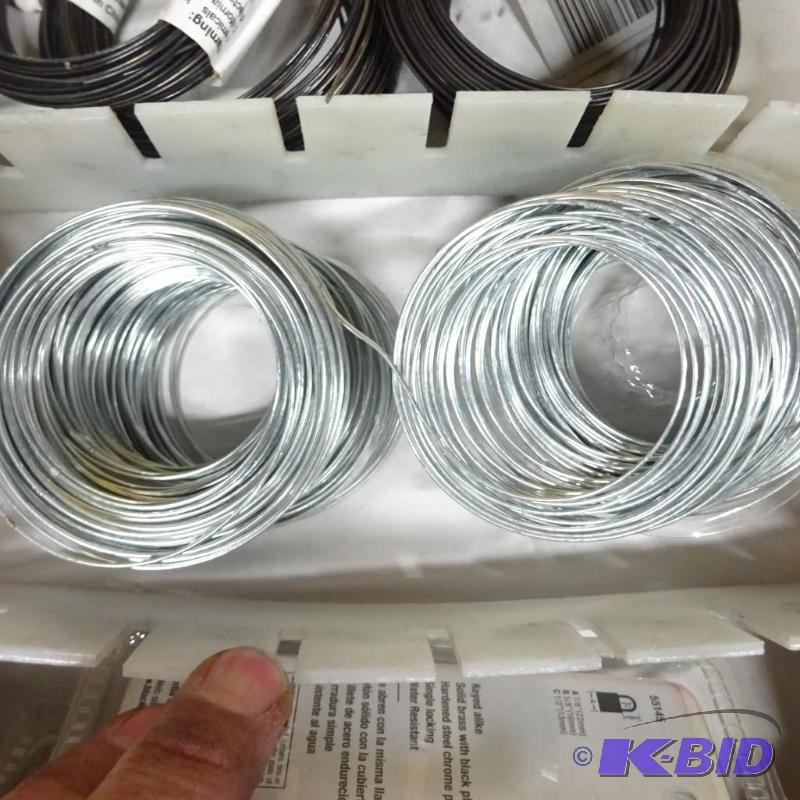 lot 179 image: Two spools of general repair wire. Approximat...