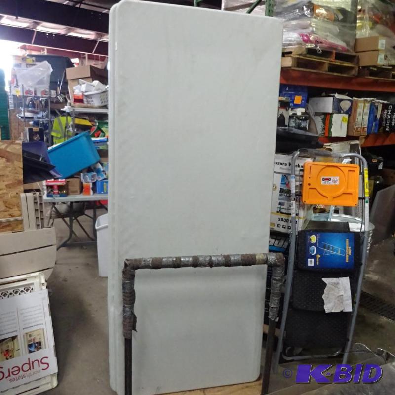 lot 233 image: New 6 ft thermoplastic folding table. Some da...