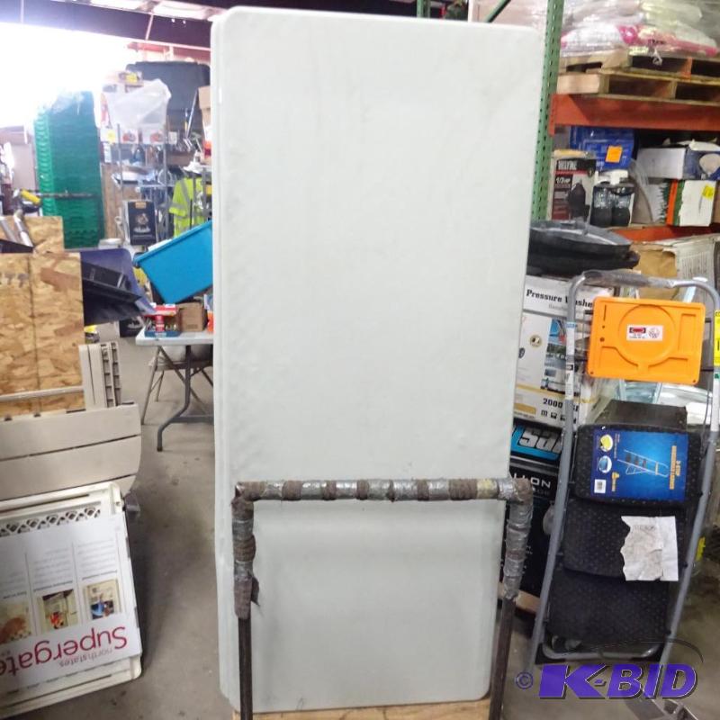 lot 235 image: New 6 ft thermoplastic folding table. Some da...