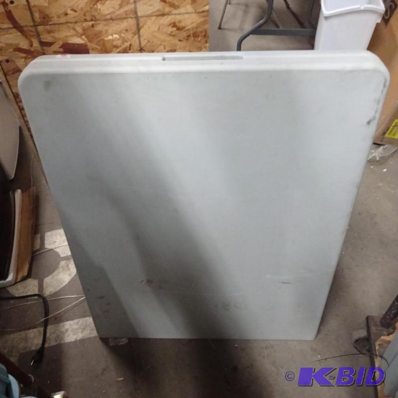 lot 238 image: New 6ft Fold In Half thermoplastic folding ta...