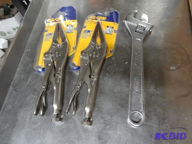 lot 24 image: 2 vise grips. 10" adjustable wrench...