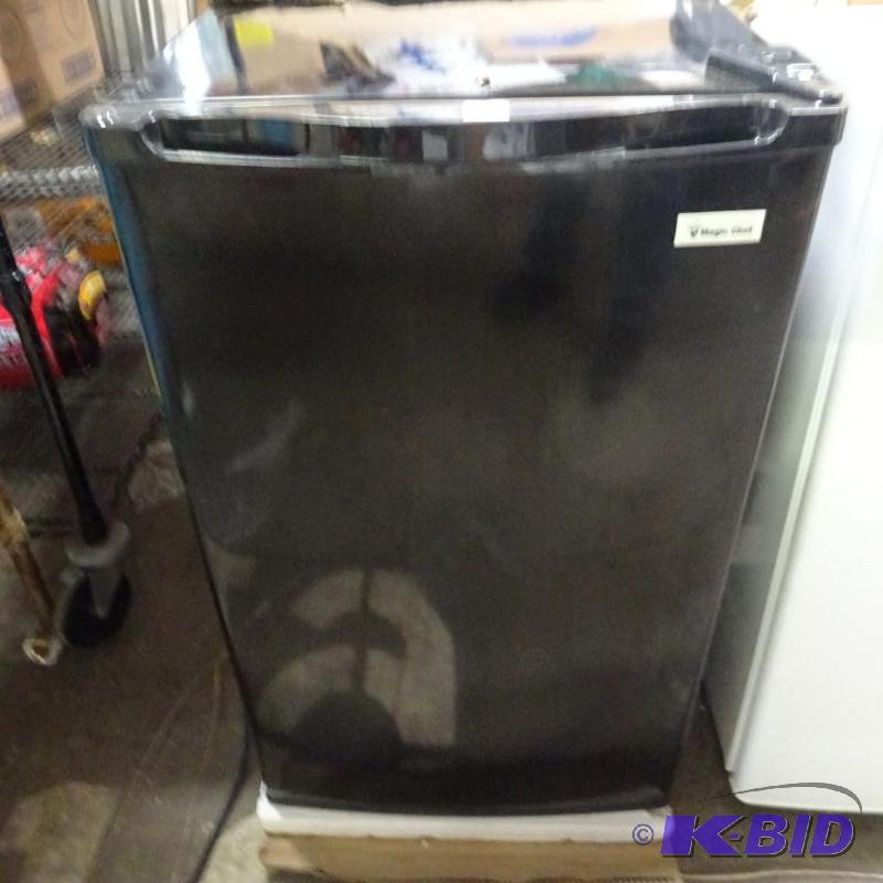 lot 290 image: New Magic Chef 4.4 cu ft refridgerator. Black...