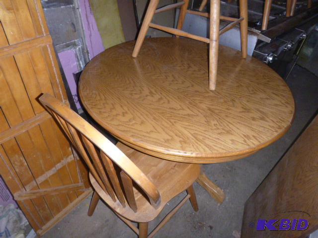 lot 128 image: Oak Table and 4 Chairs 42" diameter, plu...
