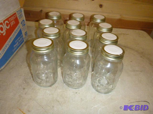 lot 202 image: 12 Mason Quart Canning Jars...
