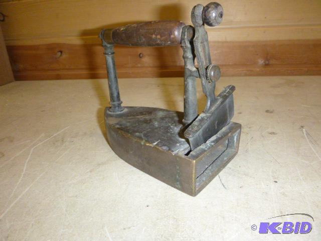 lot 281 image: Vintage Coal Heated Iron #7...