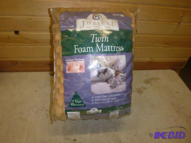 lot 33 image: Twin Foam Mattress Pad...